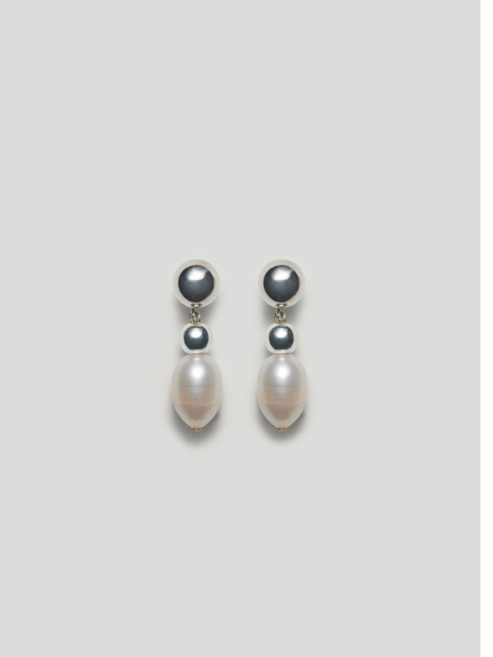 Scho brand Billie Pearl Earrings in Silver and White